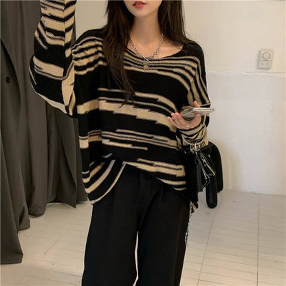 Women's knitted sweater with an elegant striped pattern and a relaxed fit NOVAE