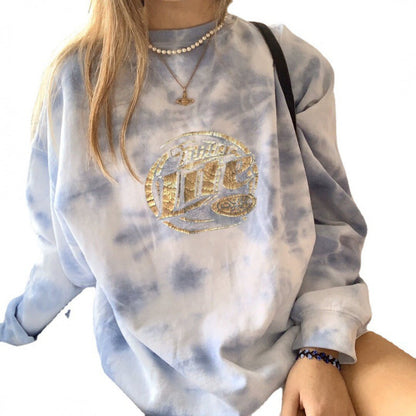 Women's oversized sweatshirt with unique batik pattern and shiny appliqué NOVAE
