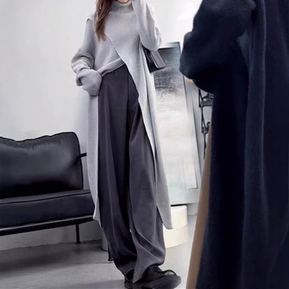 Women's knitted coat with high collar and asymmetrical cut NOVAE