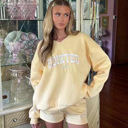 Women's casual sweatshirt with V-neck and modern NOVAE lettering