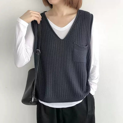 Women's knitted vest with V-neck and practical chest pocket NOVAE