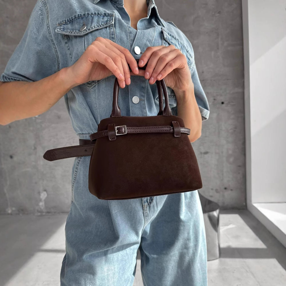 Women's denim jumpsuit with a fashionable cut and practical pockets NOVAE