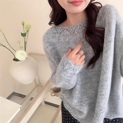 Women's fluffy knit sweater with shimmering accents and a relaxed fit NOVAE