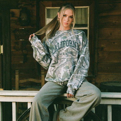 Women's casual sweatshirt with artistic camouflage pattern NOVAE