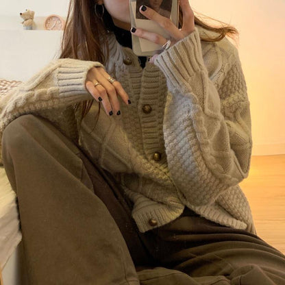 Women's chunky knit cardigan with button details and cable pattern NOVAE