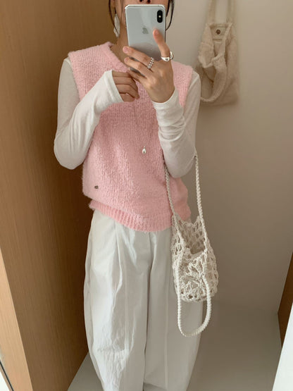 Women's knitted vest with soft, fluffy material and modern cut NOVAE