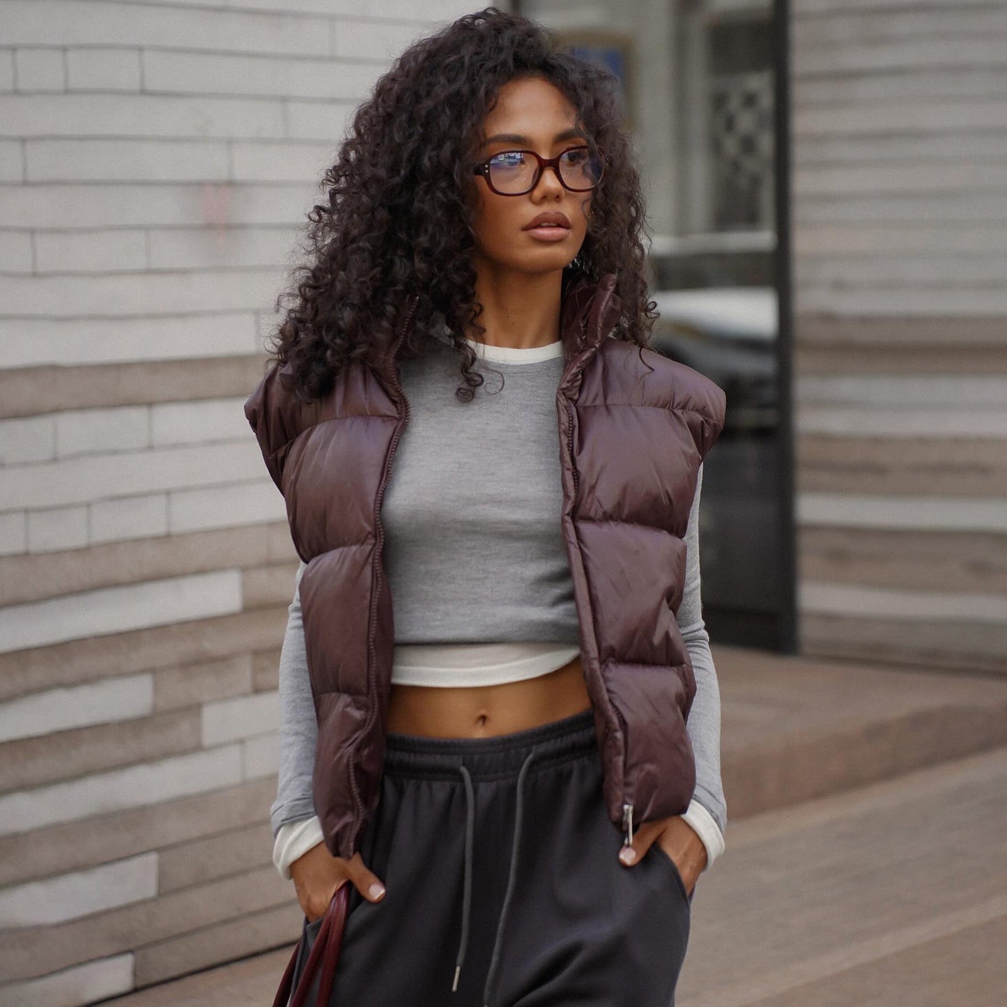 Women's quilted vest with high collar and practical zipper NOVAE