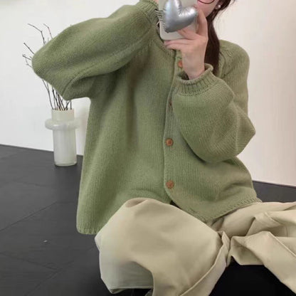 Women's cardigan with asymmetrical cut and generous balloon sleeves NOVAE