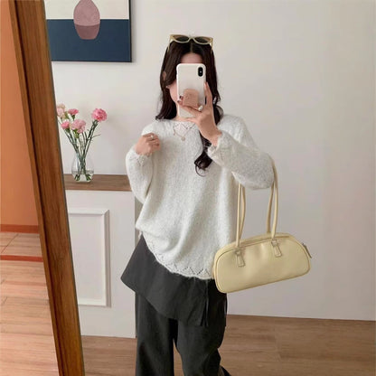 Women's fluffy knit sweater with shimmering accents and a relaxed fit NOVAE