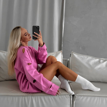 Women's oversized sweatshirt with stylish ripped details and a wide fit NOVAE