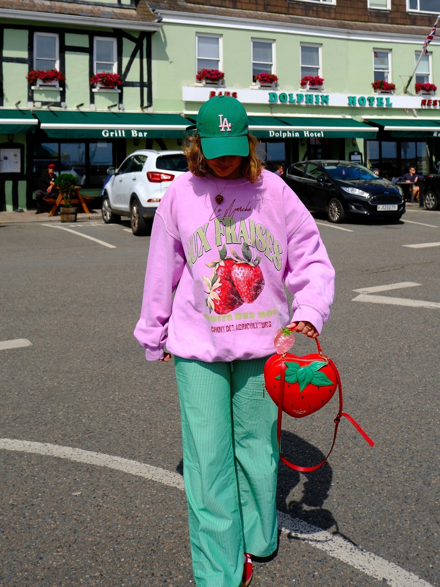 Women's fashionable sweatshirt with a striking strawberry design and comfortable cut NOVAE