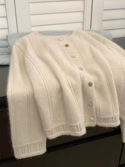 Women's cardigan with decorative rib design and button closure NOVAE