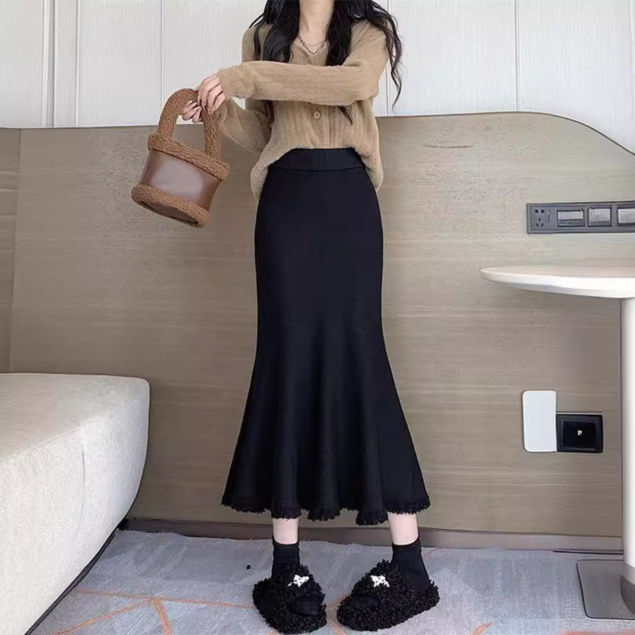 Women's elegant maxi skirt with voluminous hem and fringed details NOVAE