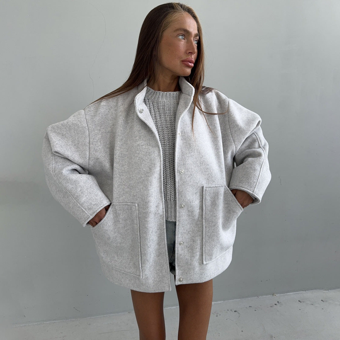 Women's oversized wool jacket with simple button details and practical pockets NOVAE