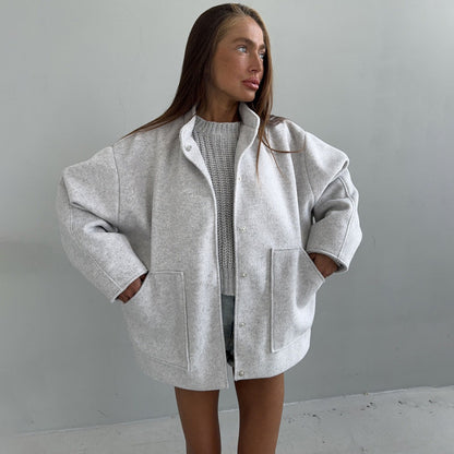 Women's oversized wool jacket with simple button details and practical pockets NOVAE