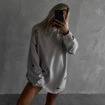 Women's oversized sweatshirt with stylish ripped details and a wide fit NOVAE