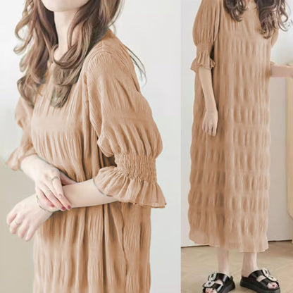 Women's casual maxi dress with elasticated puff sleeves and sophisticated textured design NOVAE