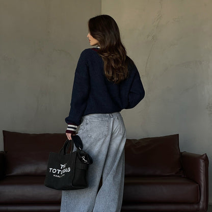 Women's casual V-neck sweater with striped details NOVAE