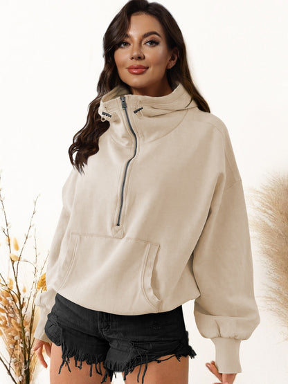 Women's sporty hoodie with half zipper and functional pockets NOVAE