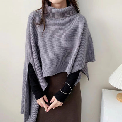 Women's knitted poncho with high collar and elegant ribbed texture NOVAE