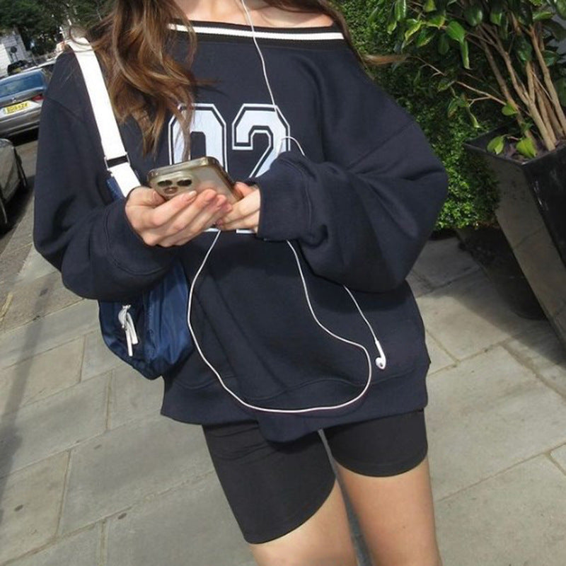 Women's casual oversized sweater with sporty print NOVAE