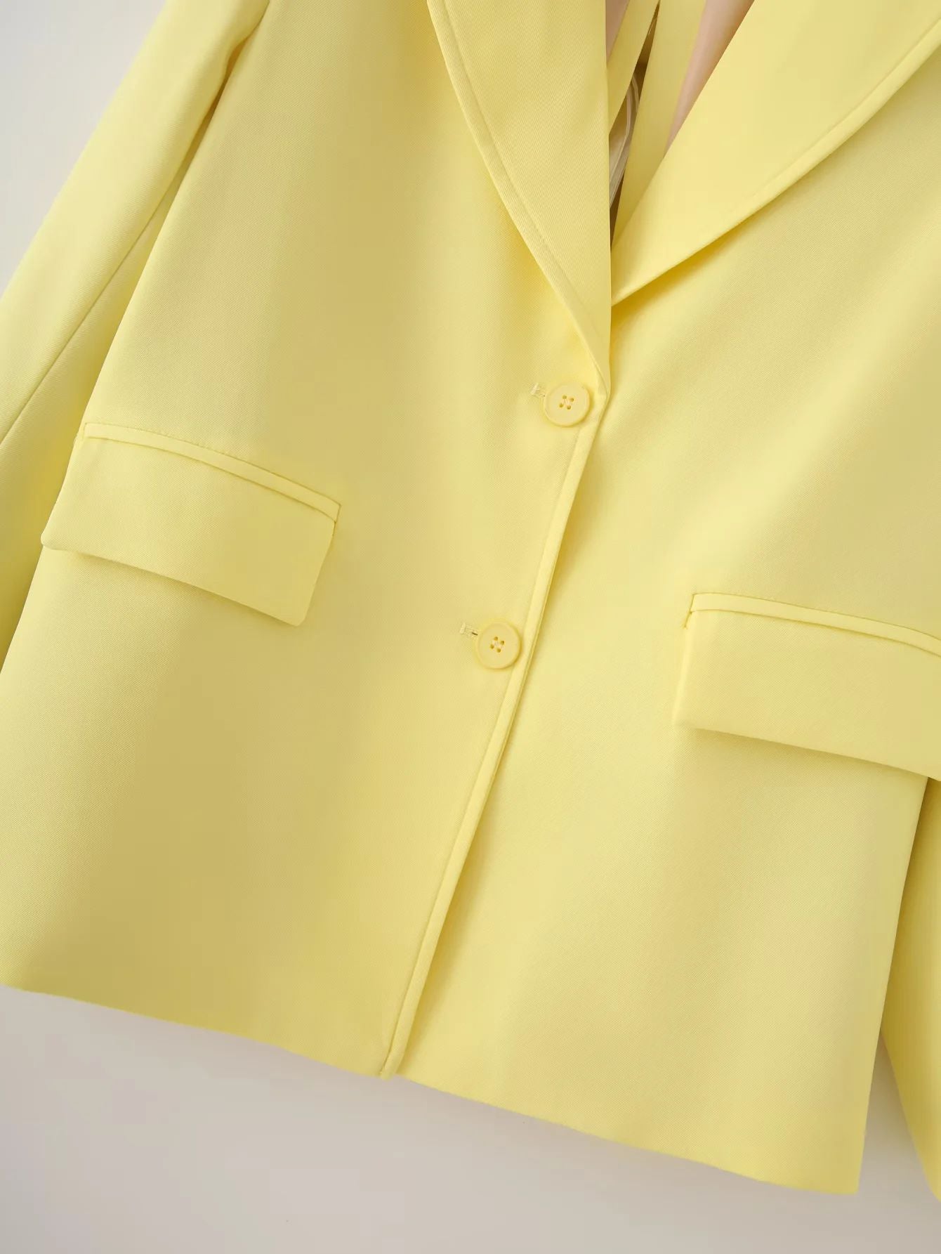 Women's blazer jacket with an elegant cut and practical pockets NOVAE