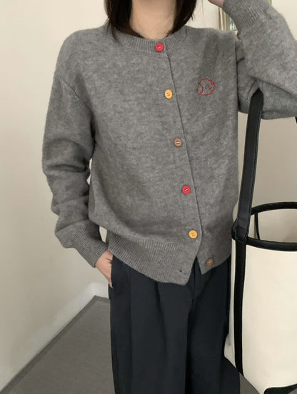 Women's cozy cardigan with buttoned neckline and embroidered motif NOVAE