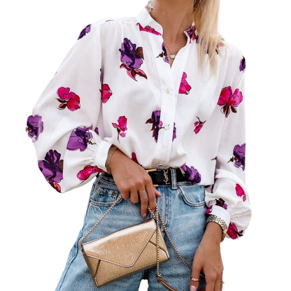 Women's elegant blouse with floral pattern and striking puff sleeves NOVAE