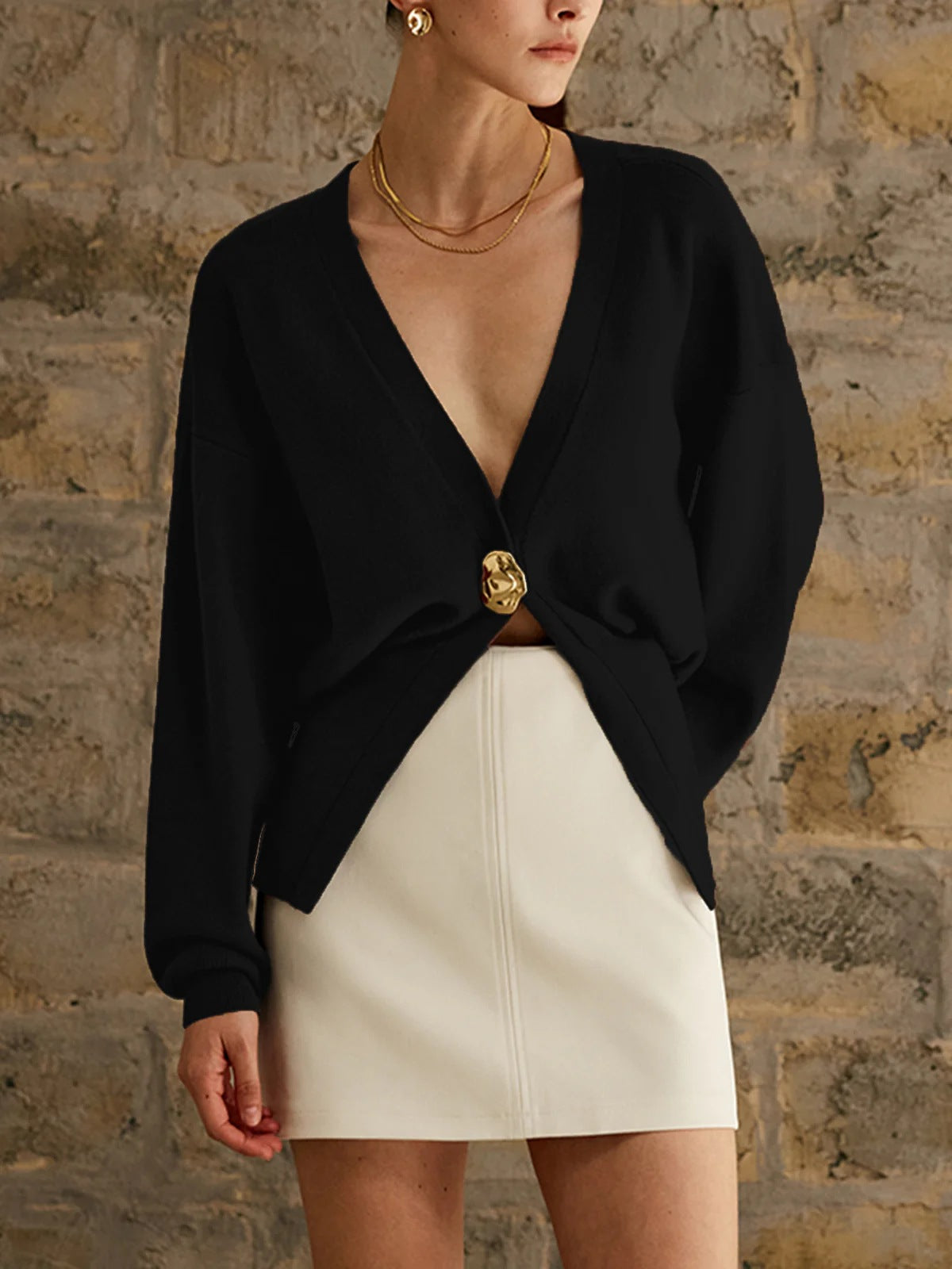 Women's elegant knit cardigan with deep V-neck and decorative button NOVAE