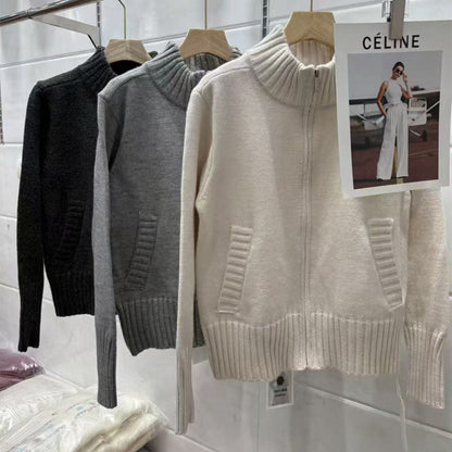 Women's knit sweater with high stand-up collar and ribbed texture NOVAE