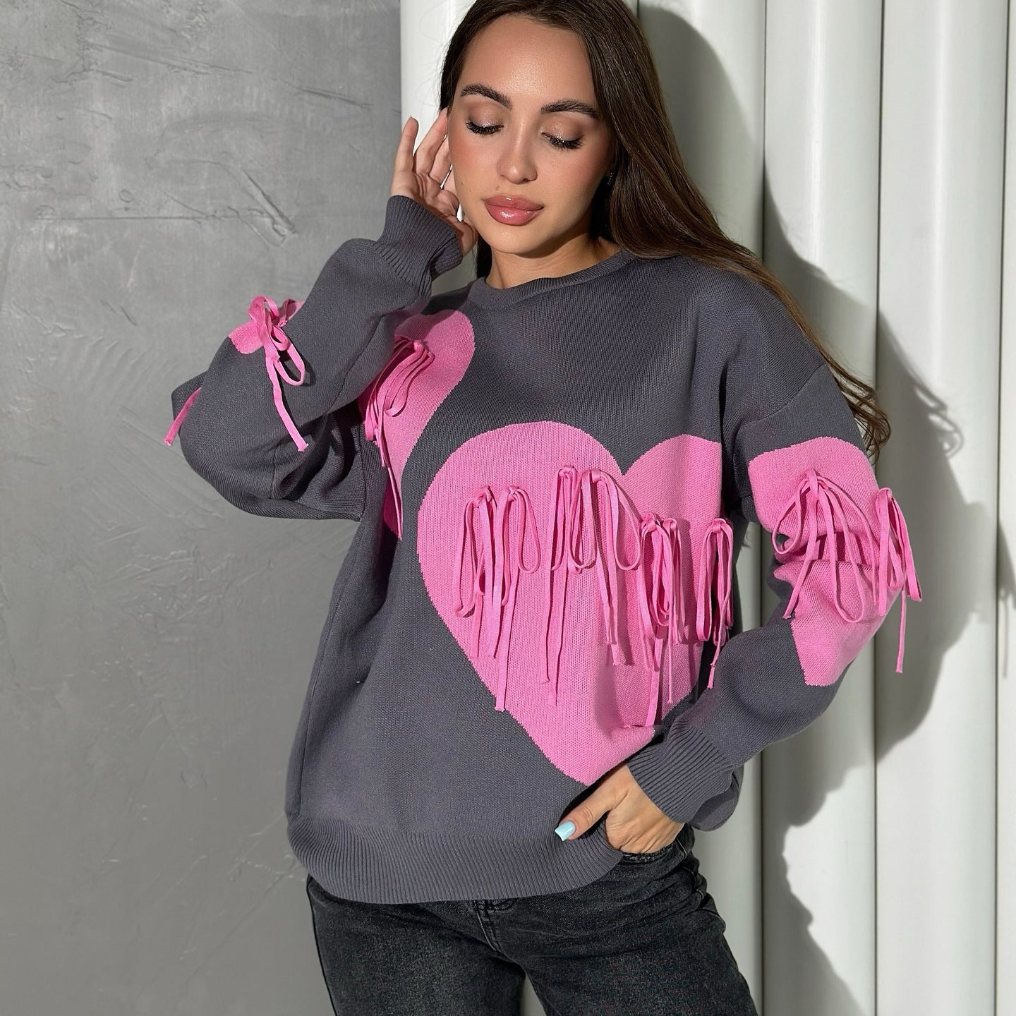 Women's fashionable sweater with a cheerful heart design and creative fringe NOVAE
