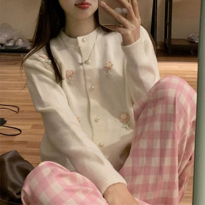 Women's cardigan with artistic floral appliqués and elegant pearl buttons NOVAE