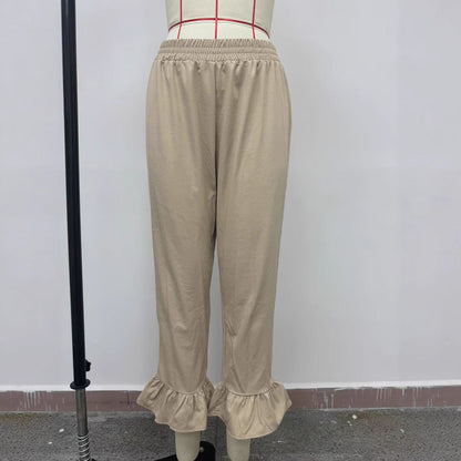 Women's casual trousers with ruffled trim NOVAE