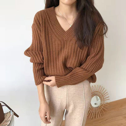 Women's viscose knit sweater with V-neck and ribbed design NOVAE