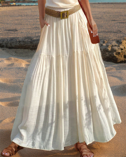 Women's wide-flared maxi skirt with elegant pleats and practical pockets NOVAE