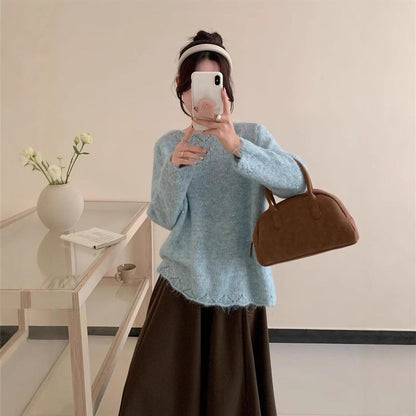 Women's fluffy knit sweater with shimmering accents and a relaxed fit NOVAE