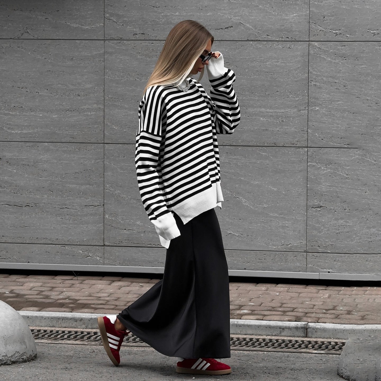 Women's striped sweater in a casual oversized style with wide sleeves NOVAE