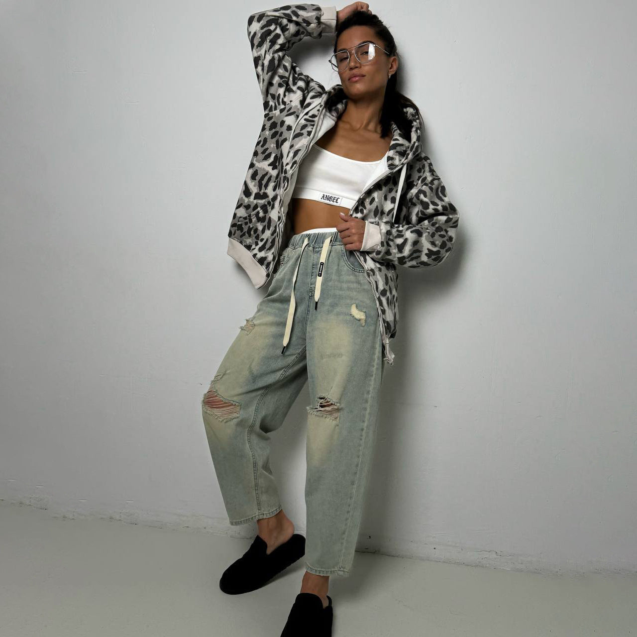 Women's hooded jacket with modern animal print and practical pockets NOVAE