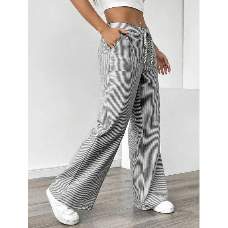 Women's wide-legged striped trousers with a high waist and practical pockets NOVAE