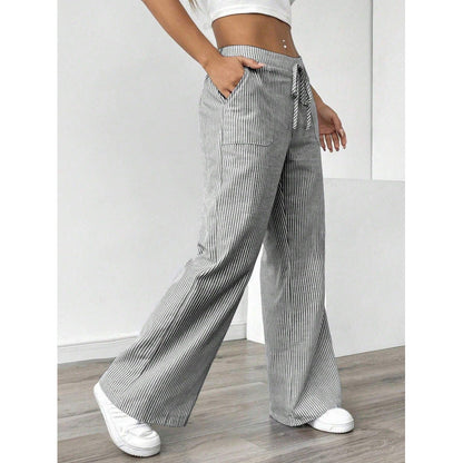 Women's wide-legged striped trousers with a high waist and practical pockets NOVAE