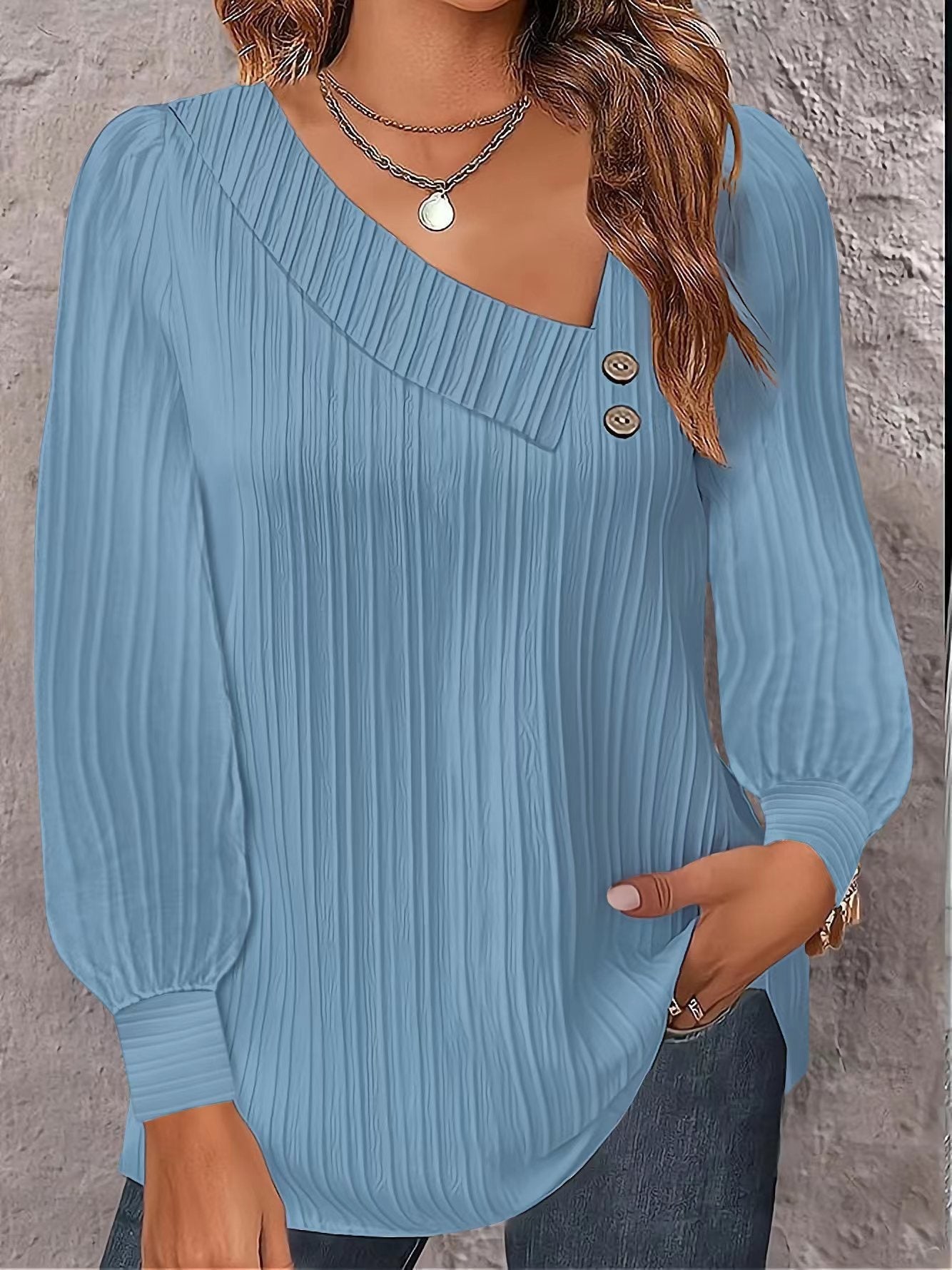 Women's stylish and elegant top with asymmetrical neckline and button placket NOVAE