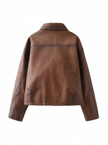 Women's cropped leather jacket with practical chest pockets and button details NOVAE