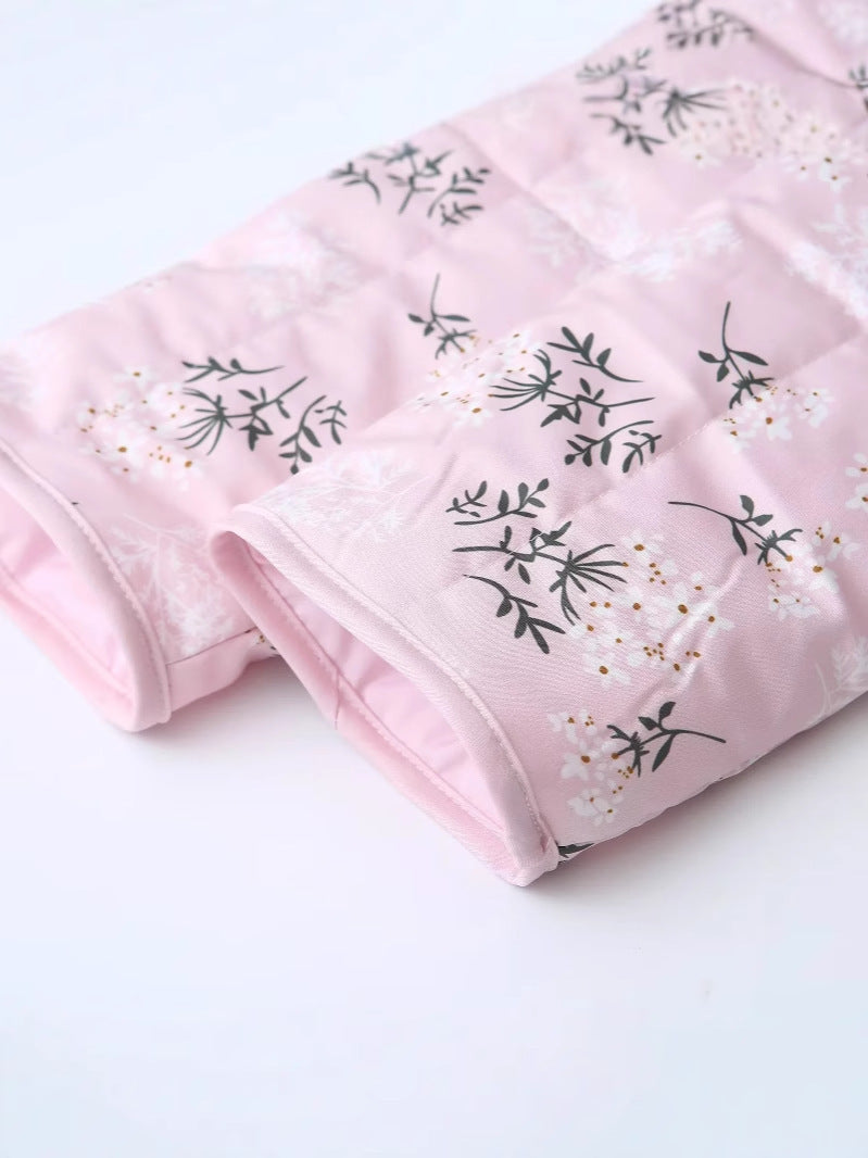 Women's quilted vest in an elegant floral print design NOVAE