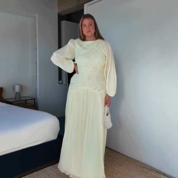 Women's maxi dress with sophisticated pleats and elegant long sleeves NOVAE