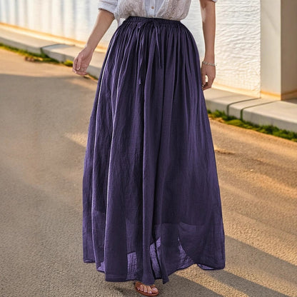 Women's elegant maxi skirt with a flowing cut and practical tie straps NOVAE