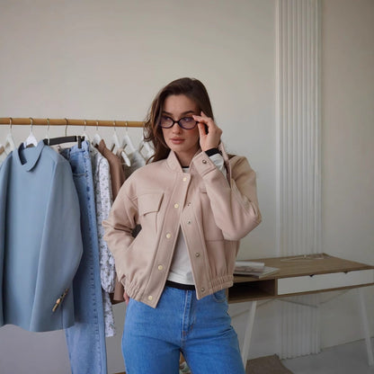 Women's fashionable short jacket with practical pockets and a cool collar NOVAE