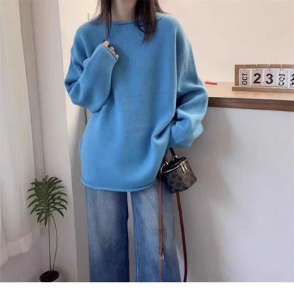 Women's oversized knit sweater with a relaxed fit and high collar NOVAE