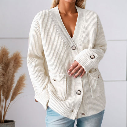 Women's chunky knit cardigan with practical pockets and elegant button details NOVAE