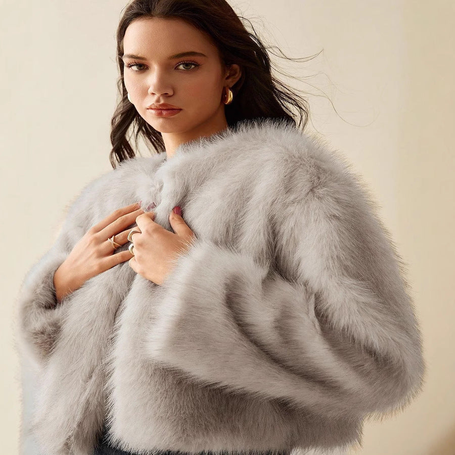 Women's extravagant short-sleeved fur jacket with voluminous sleeves NOVAE