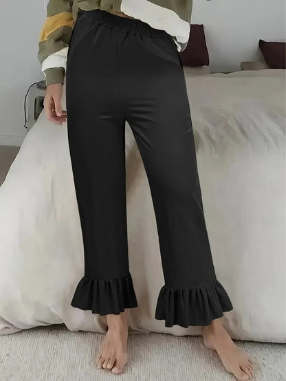 Women's casual trousers with ruffled trim NOVAE